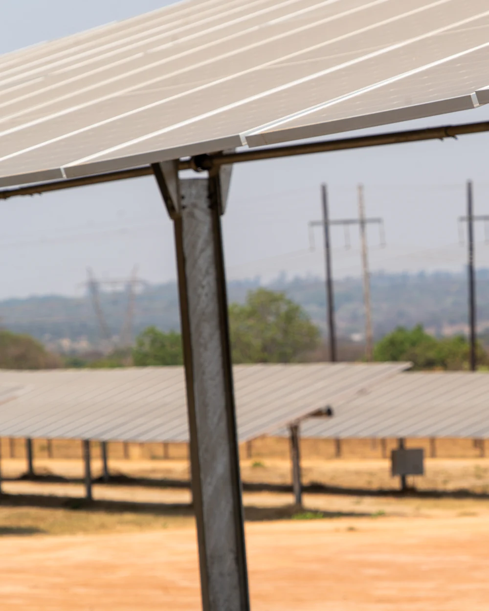 Solar plant with transmission lines behind it